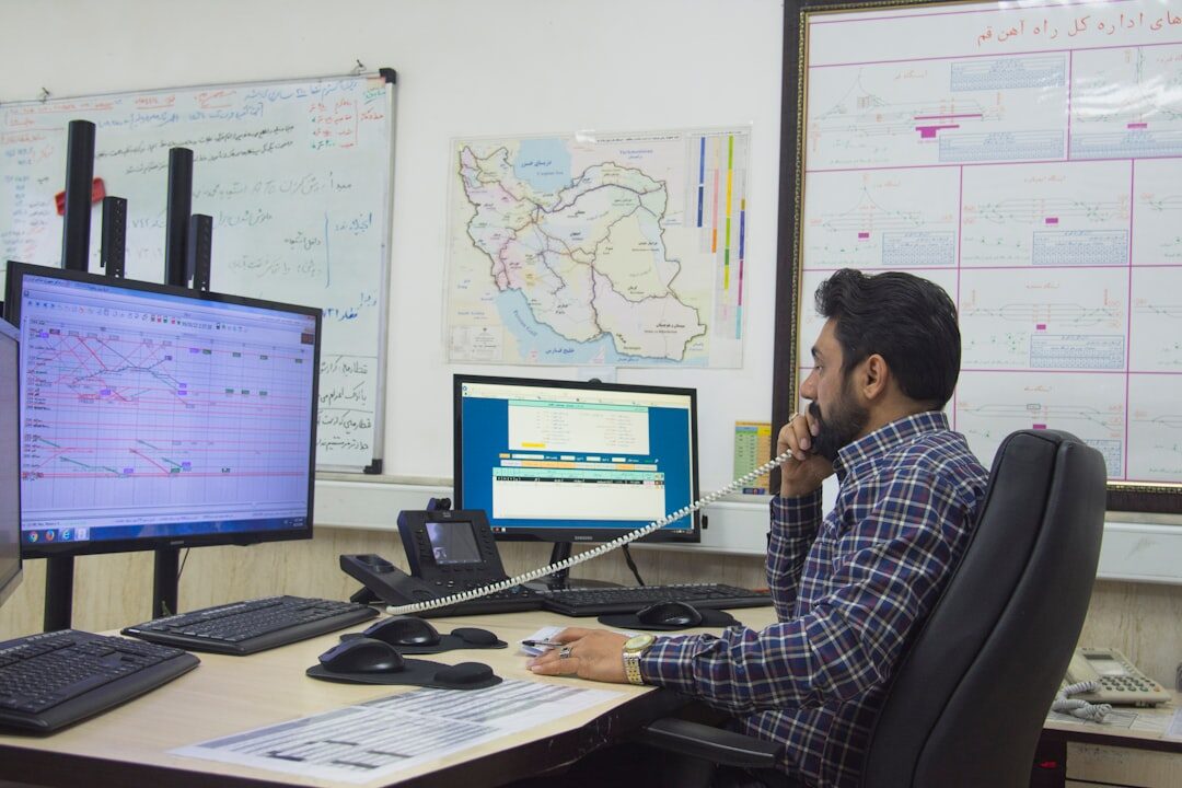 Network operations technician monitoring content distribution dashboards